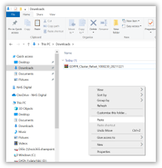 Downloads file displayed with paste button highlighted